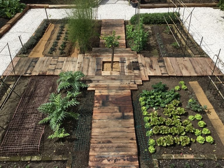 Multi-use garden with reclaimed railway sleeper pathways
