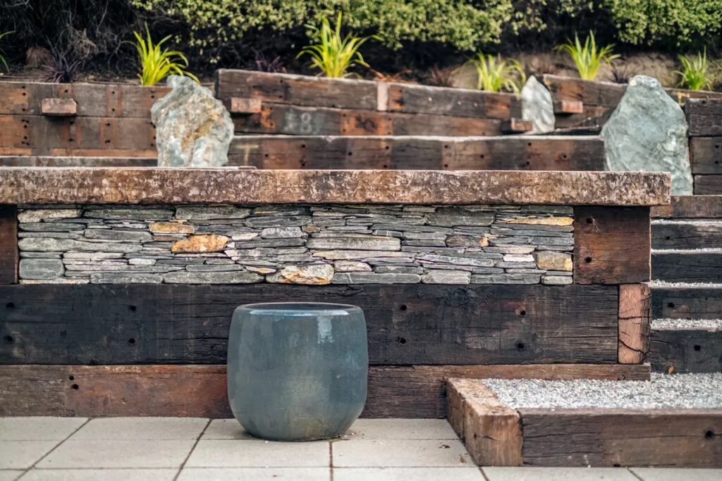 Outdoor space framed with railway sleepers, shot in Autumn lighting